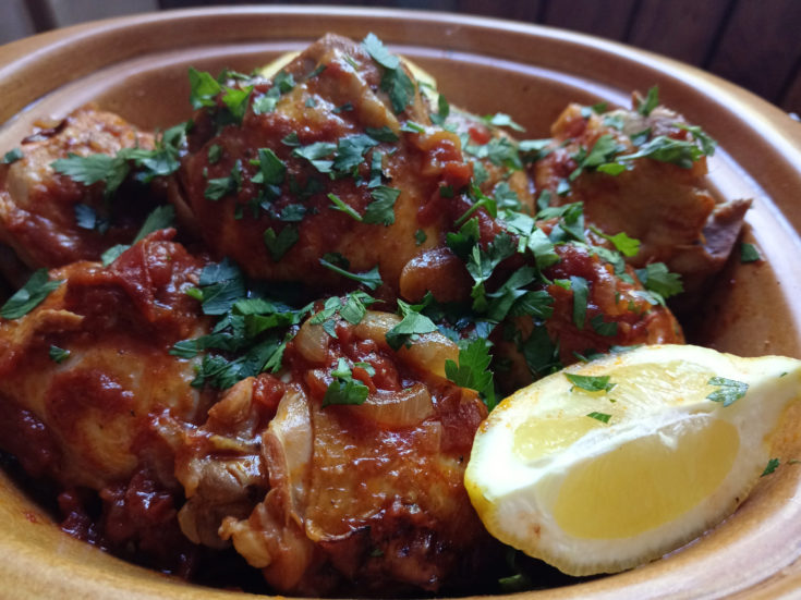 Tender chicken pieces in a glossy, sweet-and-tangy tomato sauce, served in a rustic dish with fresh parsley and a wedge of lemon — a comforting keto meal made in the Instant Pot.