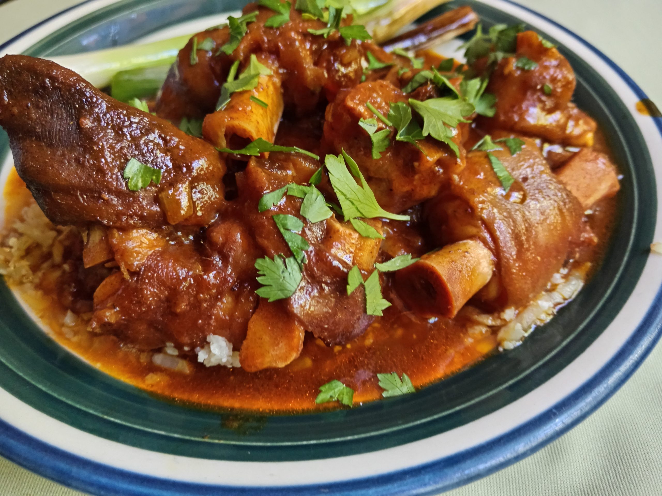Cape Malay style sheep’s trotters with rich sauce